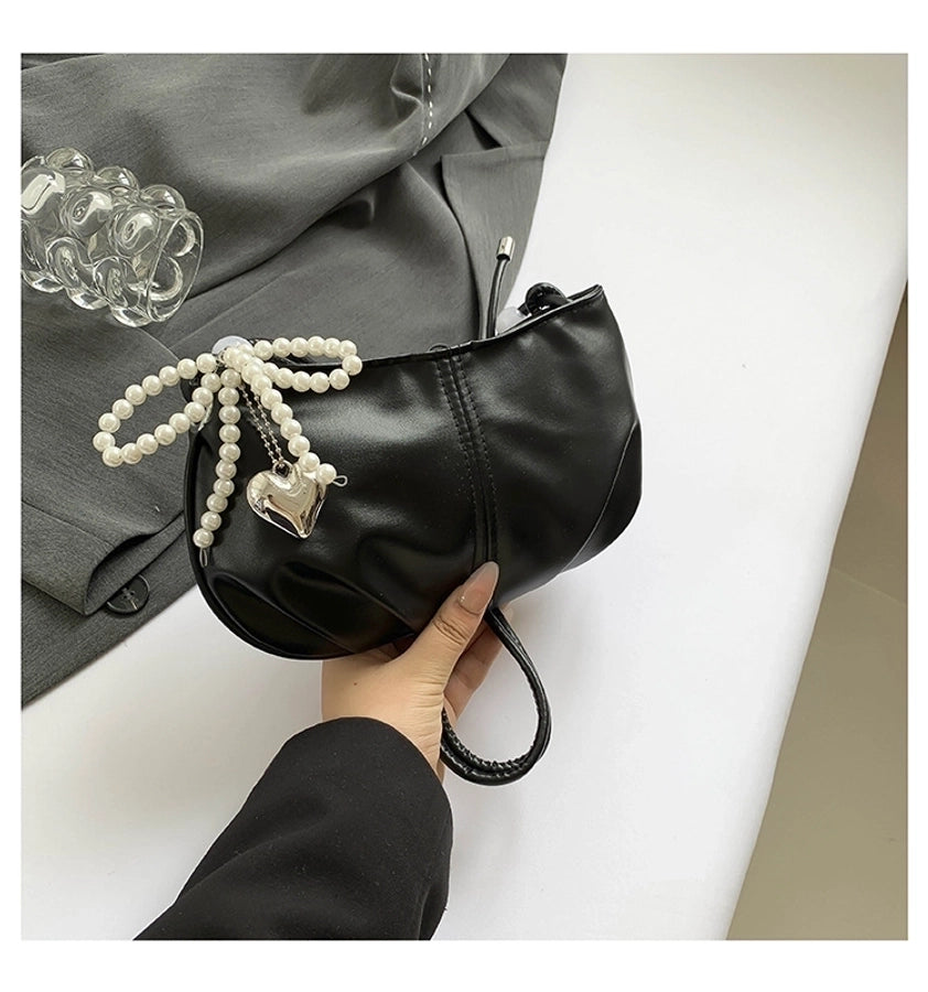Women's Pu Leather Solid Color Streetwear Pillow Shape Zipper Crossbody Bag