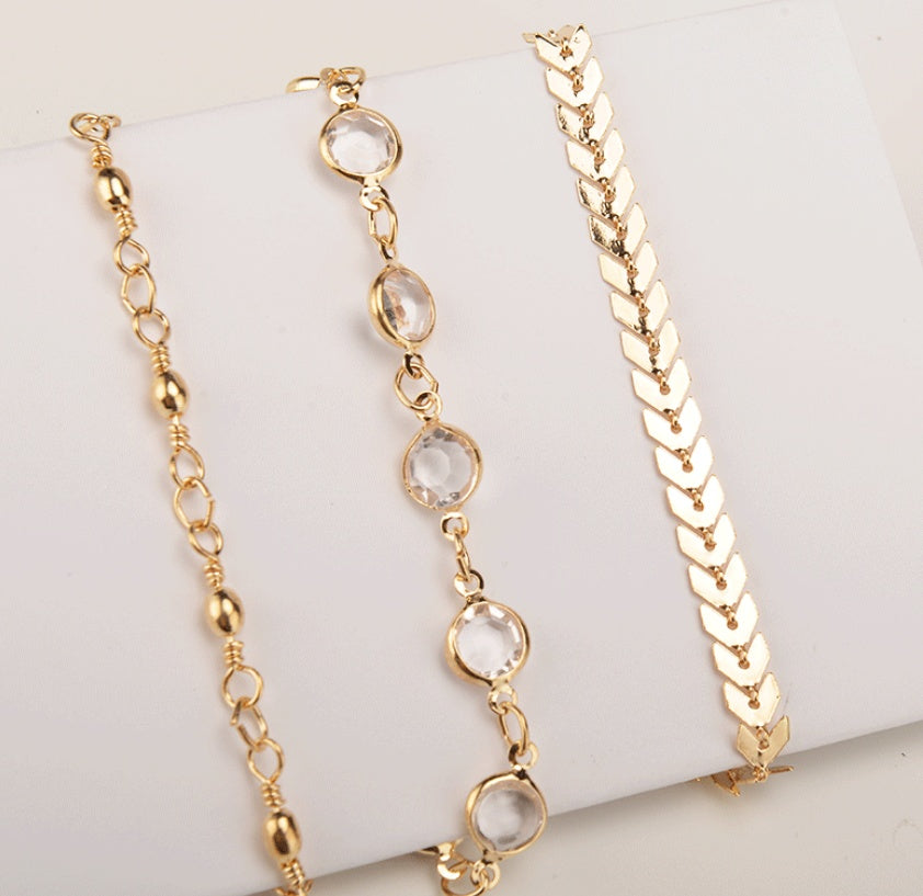 Sequined anklet arrow set with three sets of feet