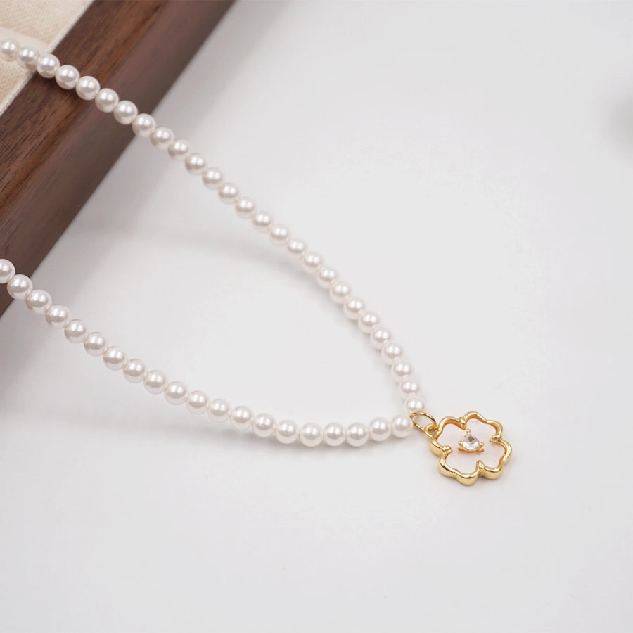 Vintage Style Simple Style Flower Imitation Pearl Copper Inlay Shell Zircon Gold Plated Women's Pendant Necklace